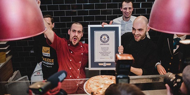 An American chef has crafted a record-breaking pizza by using 111 different types of cheese.