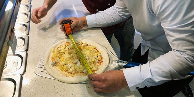The dairy-rich pie was kept small, despite the overwhelming amount of extra cheese.