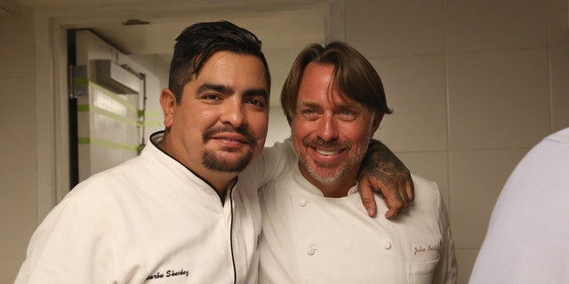 NEW YORK, NY - OCTOBER 16:  Chefs Aaron Sanchez (L) and John Besh pose at the Johnny Sanchez Dinner hosted by John Besh, Aaron Sanchez and Katy Sparks as a part of the Bank of America Dinner Series during the Food Network New York City Wine &amp; Food Festival Presented By FOOD &amp; WINE at Tavern On The Green on October 16, 2014 in New York City.  (Photo by Mireya Acierto/Getty Images for NYCWFF)