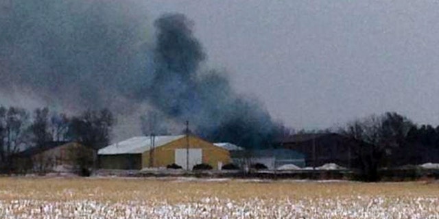 Feb. 20: Smoke rises from a fire in Northwood, Iowa as an evacuation order is in place for Northwood due to a fire at a fertilizer plant at Northwood Municipal Airport.