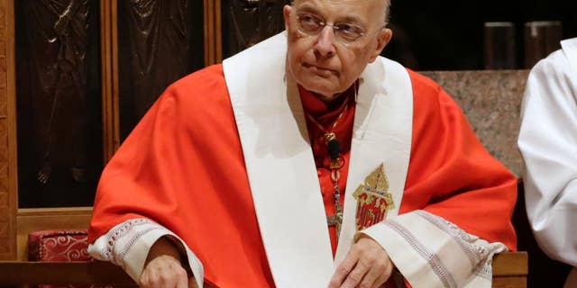 FILE - In this Nov. 17, 2014 file photo, retiring Cardinal Francis George listens at Holy Name Cathedral in Chicago during Bishop Blase Cupich's Rite of Reception service. The Archdiocese of Chicago said Tuesday, March 3, 2015, that George was admitted to the hospital Sunday, March 1, for evaluation after he stopped treatment for kidney cancer more than a month ago. Archdiocese officials say he'll stay there several days while tests are done. (AP Photo/Charles Rex Arbogast, File)