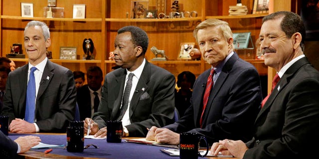 FILE: Feb. 4, 2015: from left, Chicago Mayor Rahm Emanuel, businessman Willie Wilson, Alderman Bob Fioretti, Cook County Commissioner Jesus Garcia in Chicago, Ill.