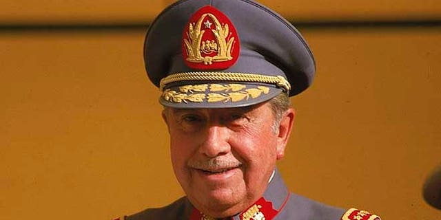 FILE - In this Oct. 1983, file photo, General Augusto Pinochet is seen in Santiago, Chile. Human rights groups and families of victims believe that military pacts of silence that hushed up many of the atrocities committed during the rule of Gen. Pinochet may finally be unraveling. (AP Photo/Eduardo Di Baia, File)