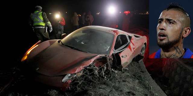 Arturo Vidal's wrecked vehicle after he crashed it near Santiago, Chile, Tuesday, June 16, 2015.