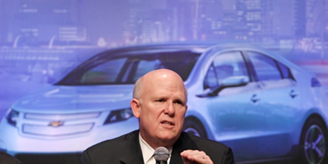 General Motor Co. Chief Executive Daniel Akerson gestures as he speaks during a media conference in Beijing Tuesday, Feb. 15, 2011. China will play a much bigger role in GM's plans as it moves to capitalize further on the world's largest auto market, Akerson said Tuesday. (AP Photo/Andy Wong)