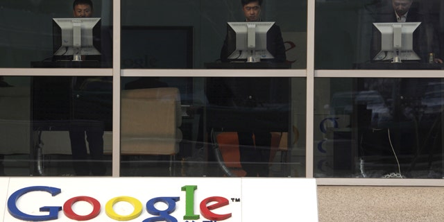 Computer users at the reception area of Google's China headquarters in Beijing.