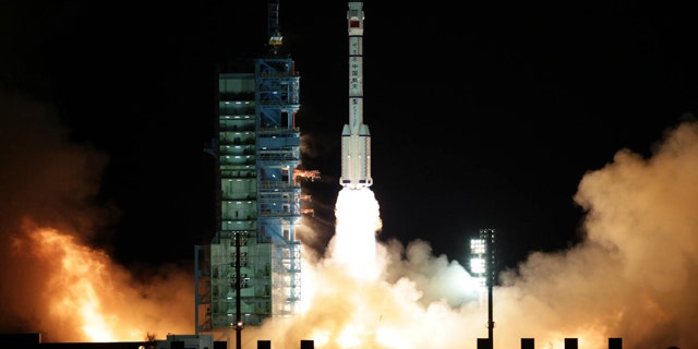 Nov. 1, 2011: A modified model of the Long March CZ-2F rocket carrying the unmanned spacecraft Shenzhou-8 blasts off from the launch pad at the Jiuquan Satellite Launch Center in northwest China's Gansu Province, the Chinese state media reported. It is the latest step in what will be a decade-long effort by China to place a manned permanent space station in orbit.