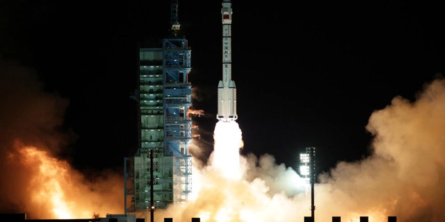 Nov. 1, 2011: A modified model of the Long March CZ-2F rocket carrying the unmanned spacecraft Shenzhou-8 blasts off from the launch pad at the Jiuquan Satellite Launch Center in northwest China's Gansu Province, the Chinese state media reported. It is the latest step in what will be a decade-long effort by China to place a manned permanent space station in orbit.