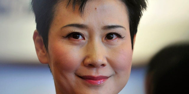 March 4, 2011: Li Xiaolin, chairwoman of the state-owned electricity giant China Power International Development Ltd., attends the Chinese People's Political Consultative Conference (CPPCC) in Beijing. Li, daughter of former Chinese Premier Li Peng, held as much as $2.48 million in a secret HSBC account in Switzerland, the International Consortium of Investigative Journalists has found. (AP Photo)