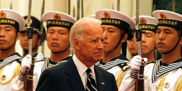 Aug. 18: U.S. Vice President Joseph Biden inspects a guard of honor during a welcome ceremony held at the Great Hall of the People in Beijing, China.