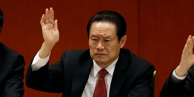 Nov. 14, 2012 - FILE photo of Zhou Yongkang, the then Chinese Communist Party Politburo Standing Committee member in charge of security, during the 18th Communist Party Congress in Beijing, China. China's official Xinhua News Agency says the country's former security chief, Zhou Yongkang, has been expelled from the Communist Party.