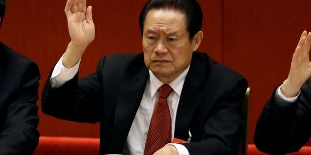 Nov. 14, 2012 - FILE photo of Zhou Yongkang, the then Chinese Communist Party Politburo Standing Committee member in charge of security, during the 18th Communist Party Congress in Beijing, China. China's official Xinhua News Agency says the country's former security chief, Zhou Yongkang, has been expelled from the Communist Party.