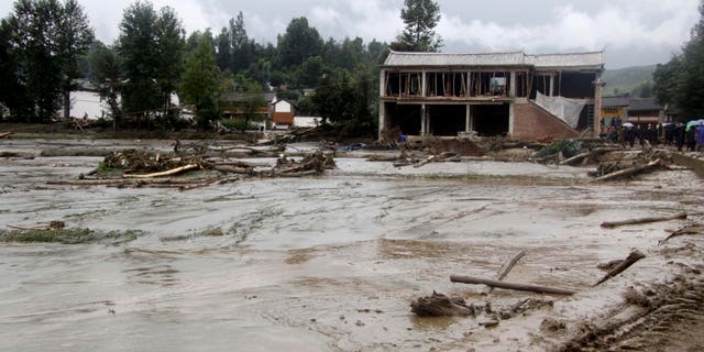 Aug. 6, 2012: In this photo released by China's Xinhua News Agency, mud covers the area after a mudslide in Tiejia Village of Eryuan County of Dali Bai Autonomous Prefecture, southwest China's Yunnan Province.