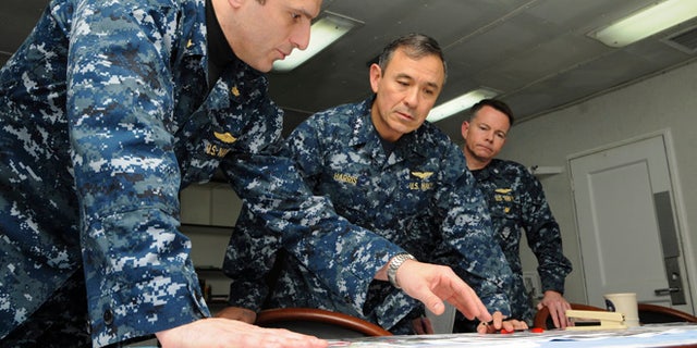 FILE 2011: Defense Secretary Voltaire Gazmin said the commander, Adm. Harry Harris Jr., center, assured him of U.S. readiness to provide assistance.