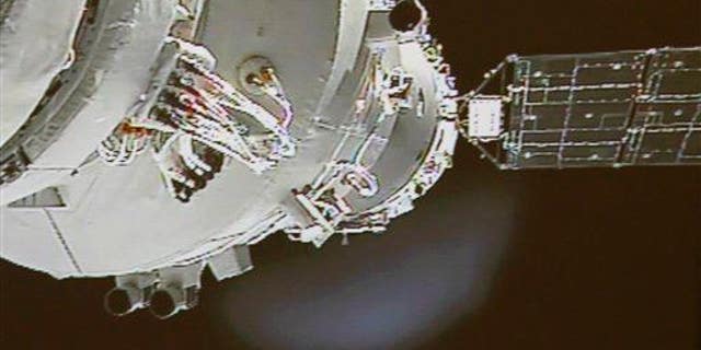 The Shenzhou-9 spacecraft docks with the Tiangong-1 space lab in 2012. The lab is currently falling back to Earth and is scheduled to burn up in the atmosphere sometime in the second half of 2017.