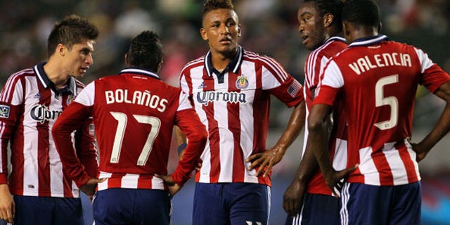 CARSON, CA - SEPTEMBER 15: Juan Agudelo #11 of Chivas USA and his teammates look on prior to a penalty kick being awarded to the San Jose Earthquakes during the MLS match at The Home Depot Center on September 15, 2012 in Carson, California. The Earthquakes defeated Chivas USA 2-0. (Photo by Victor Decolongon/Getty Images)
