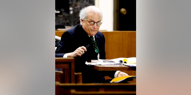 Jim Berry, attorney for 17-year-old Chancey Luna, sits in the courtroom Thursday, April 16, 2015, in Duncan, Okla. Luna is accused of first-degree murder for the shooting of Australian baseball player Chris Lane. (Steve Sisney/The Oklahoman via AP)