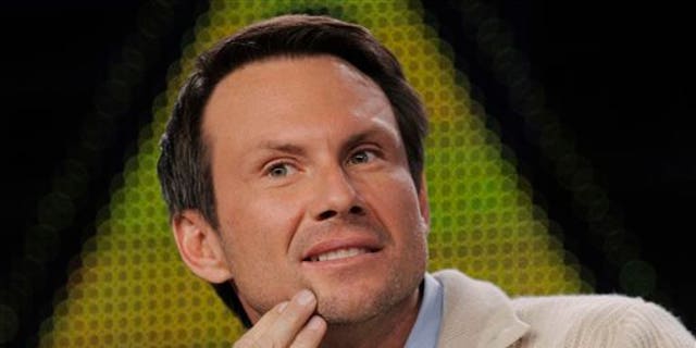 FILE - In this Jan. 11, 2011 file photo, Christian Slater, a cast member in the FOX series "Breaking In," is pictured during the FOX Broadcasting Company Television Critics Association winter press tour in Pasadena, Calif. Slater has married his girlfriend at an impromptu ceremony. Slater's spokeswoman said the 44-year-old actor wed his girlfriend of three years, Brittany Lopez, on Monday, Dec. 2, 2013, at the courthouse in Coral Gables, Fla.  (AP Photo/Chris Pizzello, File)