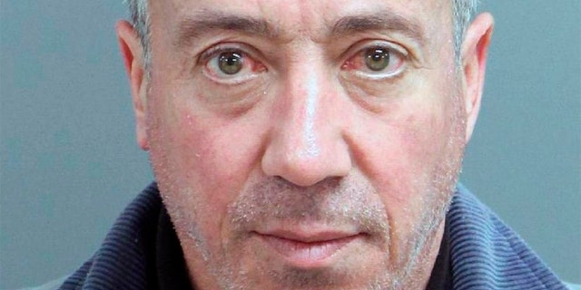 This undated mug shot shows Christian Desgroux, 57, who’s accused of pretending to be a U.S. Army general when he landed a chartered helicopter at a technology company in North Carolina in November.