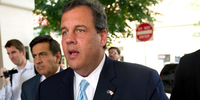 In this Wednesday, Sept. 17, 2014 photo, New Jersey Gov. Chris Christie walks into a fundraiser for Maryland Republican gubernatorial candidate Larry Hogan at Bethesda, Md.