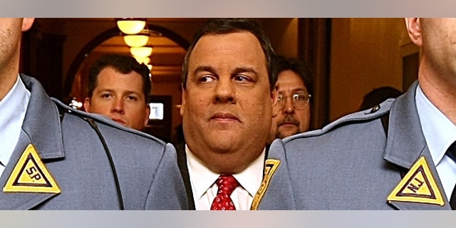 Governor Chris Christie makes his way down to the Assembly Chambers to give the State of the State Address at the Statehouse in Trenton, N.J. on Tuesday, Jan. 8, 2013. (Governor's Office/Tim Larsen)