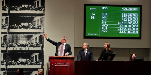 David Hockney’s “Portrait of an Artist” previously held the record at Christie’s when it sold for $90.3 million last November. (Associated Press)<br data-cke-eol="1">