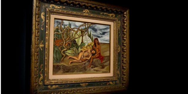EDS NOTE: NUDITY - In this Friday, April 29, 2016 file photo, the painting, "Two Nudes in the Forest (The Land Itself)" by Frida Khalo, is on display during the press preview of "Bound to Fail" at Christie's auction house in New York. The painting by Kahlo is poised to set a new auction record for the Mexican painter at Christieâs sale of impressionist and modern art on Thursday evening, May 12, 2016. (AP Photo/Mary Altaffer, File)