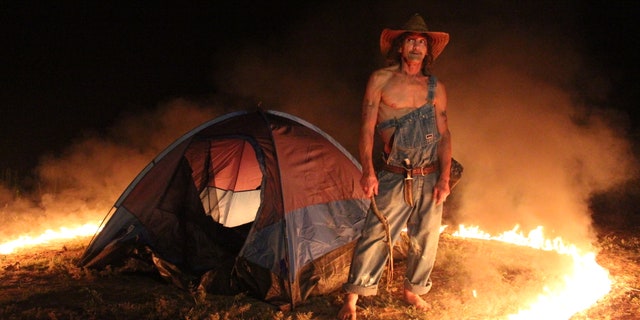 Jimmy standing in the ring of fire.