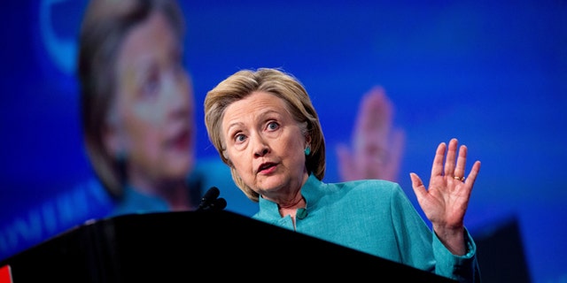 Democratic presidential candidate Hillary Clinton speaks at the U.S. Conference of Mayors in Indianapolis, Sunday, June 26, 2016, on the United Kingdom's vote to leave the European Union, America's economy, and other issues. (AP Photo/Andrew Harnik)
