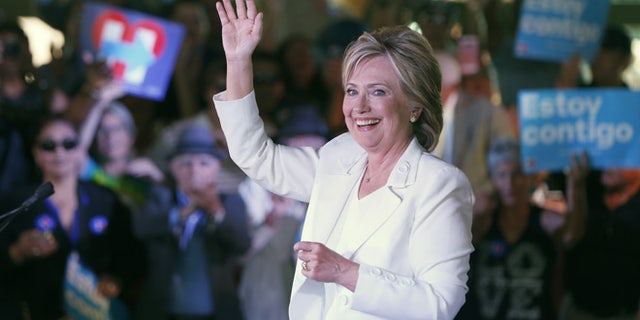 SAN ANTONIO, TX - OCTOBER 15: Democratic U.S. presidential hopeful Hillary Clinton acknowledges supporters at a "Latinos for Hillary" grassroots event October 15, 2015 in San Antonio, Texas. The event was part of the campaign's ongoing effort to build an organization outside of the four early states and work hard for every vote. (Photo by Erich Schlegel/Getty Images)