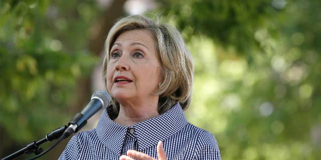 FILE - In this Aug. 15, 2015 file photo, Democratic presidential candidate Hillary Rodham Clinton speaks at the Iowa State Fair in Des Moines, Iowa. The State Department review of Clinton's emails so far has found as many as 305 messages that could contain classified information and require further review by federal agencies, the department said Monday. (AP Photo/Charlie Neibergall, File)