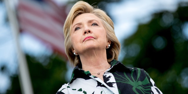 Democratic presidential candidate Hillary Clinton appears on stage at a rally a Fort Hayes Metropolitan Education Center in Columbus, Ohio, Sunday, July 31, 2016. Clinton and Kaine are on a three-day bus tour through the rust belt. (AP Photo/Andrew Harnik)