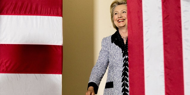 Democratic presidential candidate Hillary Clinton arrives to speak at a rally at the International Brotherhood of Electrical Workers Circuit Center in Pittsburgh, Tuesday, June 14, 2016. (AP Photo/Andrew Harnik)