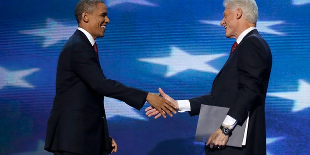 Sept. 5, 2012: President Barack Obama shakes hands with Former President Bill Clinton during the Democratic National Convention in Charlotte, N.C.