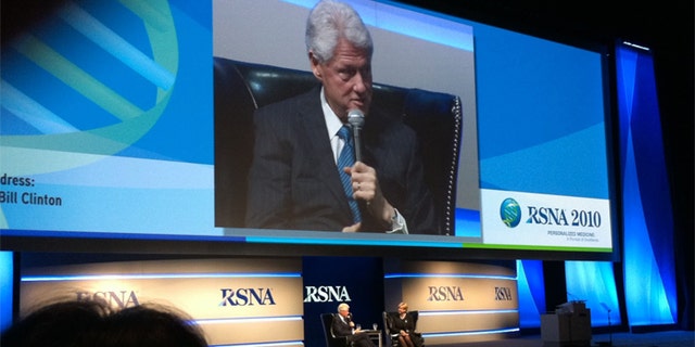 Clinton's appearance raised concerns among members of the Radiological Society of North America, who wanted to know who paid the bill.