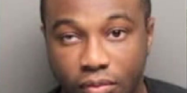 This undated photo shows Francis Ngissah, who is accused of luring teens to the US on the promise of basketball training.