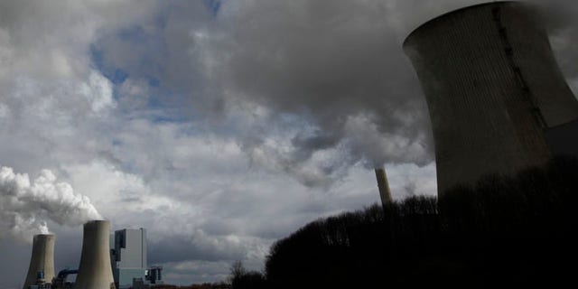 This file image shows steam rising from a coal power plant.
