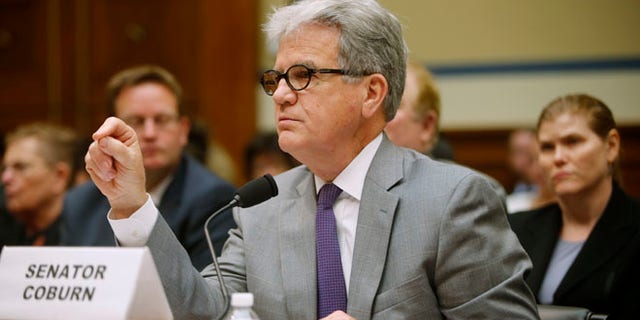 Sen. Tom Coburn, R-Okla. testifies on Capitol Hill in Washington, Tuesday, June 10, 2014, before the House Oversight and Government Reform Committee hearing regarding social security and disability benefits.