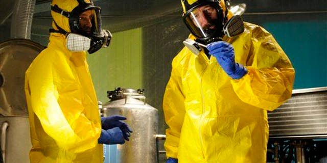 Jesse Pinkman, played by Aaron Paul, left, and Walter White, played by Bryan Cranston, cooking meth in a home being fumigated in the fifth season of "Breaking Bad."