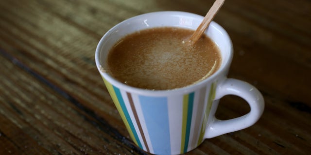 MIAMI, FL - MARCH 10: An expresso coffee sits on the counter at the Los Pinarenos Fruteria on March 10, 2015 in Miami, Florida. A panel of government-appointed scientists at the Dietary Guidelines Advisory Committee charged with proposing changes to U.S. dietary guidelines announced recently that three to five cups of coffee daily do not have long-term health risks, and help reduce the risk for heart disease and type 2 diabetes. (Photo by Joe Raedle/Getty Images)
