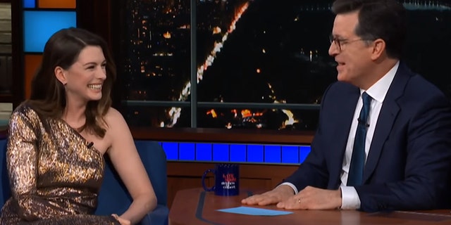 Anne Hathaway and Stephen Colbert rewatch the actress' first ever TV commercial that she booked at the age of 14.