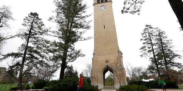 Dec. 12, 2012: In this file photo students walk past the Campanile on the Iowa State University campus in Ames, Iowa.