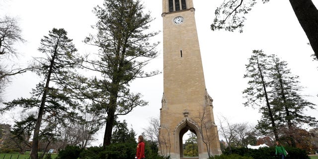 Dec. 12, 2012: In this file photo students walk past the Campanile on the Iowa State University campus in Ames, Iowa.