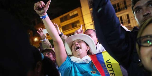 BOGOTA, COLOMBIA - OCTOBER 02: 'No' supporters celebrate at a rally following their victory in the referendum on a peace accord to end the 52-year-old guerrilla war between the FARC and the state on October 2, 2016 in Bogota, Colombia.