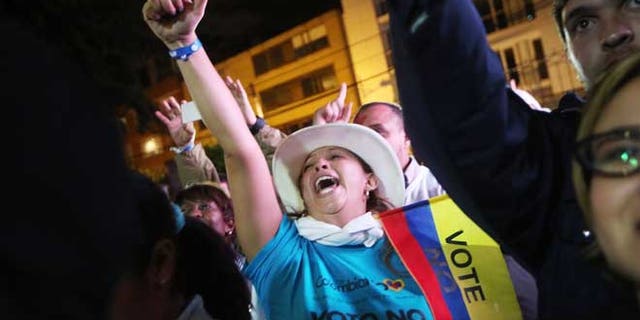 BOGOTA, COLOMBIA - OCTOBER 02: 'No' supporters celebrate at a rally following their victory in the referendum on a peace accord to end the 52-year-old guerrilla war between the FARC and the state on October 2, 2016 in Bogota, Colombia.