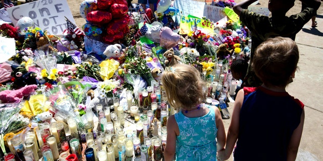 Across the street from the movie theater is a memorial for the victims of the shootings in Aurora, Colorado.