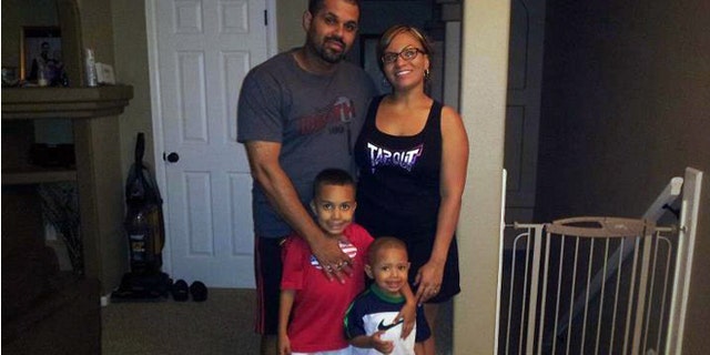 Rene Lima Marin with his wife Jasmine and children Justus, 7, and Josiah, 4, at their home in Aurora, Colo.