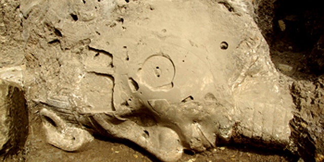 The face of the colossal alabaster statue of Amenhotep III recently found near the third pylon of his funerary temple at Kom el-Hettan.