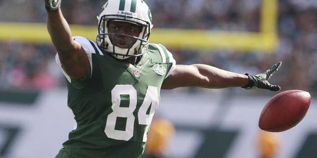 This Oct. 14, 2012 photo, New York Jets wide receiver Stephen Hill (84) celebrates after making a first down during the first half of an NFL football game against the Indianapolis Colts in East Rutherford, N.J. Hill, who has dealt with injuries and inconsistent play, is in the competition to be a starter for the Jets and has had a pretty good camp. He caught a few touchdown passes in practice Friday and coach Rex Ryan says "it's coming" for Hill. (AP Photo/Seth Wenig)