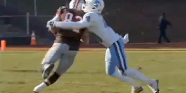 This undated photo shows an unidentified Columbia football player tackling an opponent.